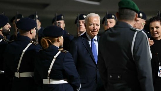 US President Joe Biden is welcomed with military honours upon arrival at Berlin-Brandenburg Airport (BER) in Schoenefeld, southeast of the German capital, late on October 17, 2024. US President Joe Biden began a farewell visit to Germany on October 17 for talks with European leaders on support for Ukraine in its war against Russia and on the Middle East conflict.(AFP)