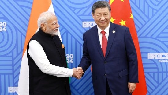 Chinese president Xi Jinping and Prime Minister Narendra Modi on the sidelines of the BRICS summit in Kazan, Russia October 23, 2024.(Reuters)