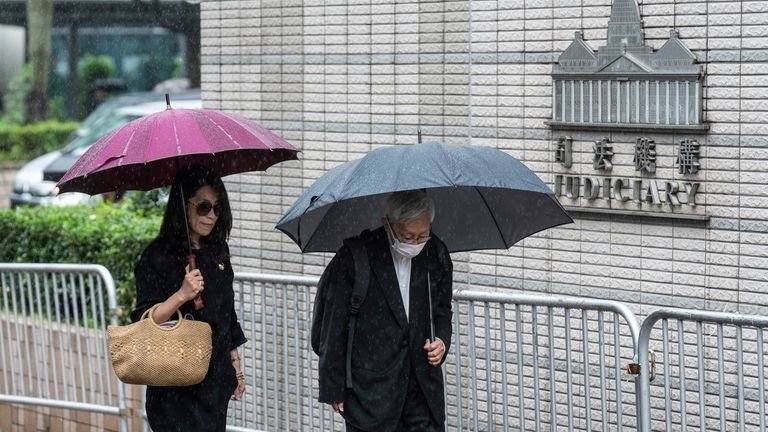 Jimmy Lai's wife Teresa Lai, left, and retired Chinese cardinal...