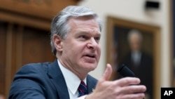 FILE - FBI Director Christopher Wray testifies before a House committee, July 24, 2024, on Capitol Hill in Washington.