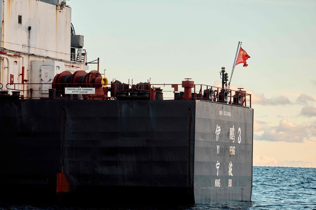 The Chinese bulk carrier Yi Peng 3 is anchored and being monitored by a Danish naval patrol vessel (unseen) in the sea of Kattegat on November 20. Photo: AFP