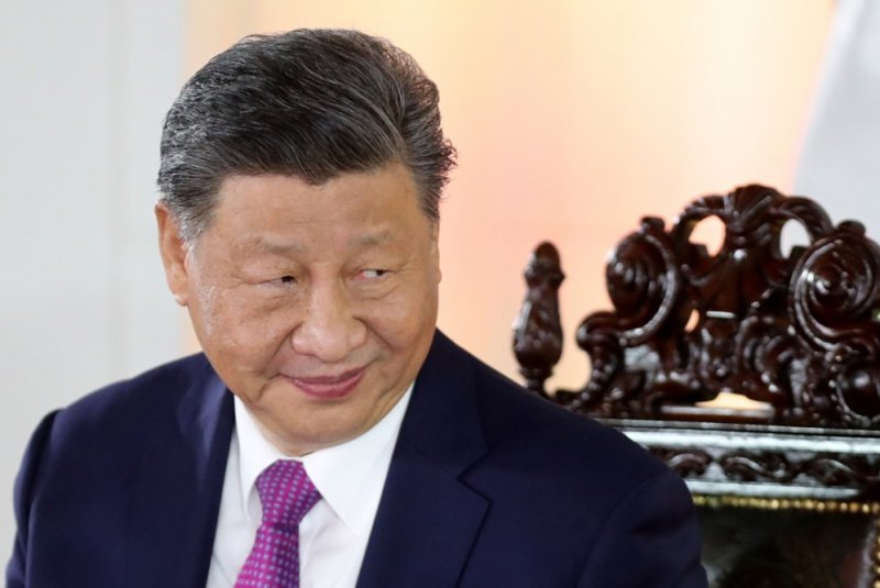 Chinese President Xi Jinping attends an inauguration event for the Chancay mega-port at the Government Palace in Lima, Peru, in November. On Tuesday in an end-of-year address, he said no one can stop China from annexing Taiwan. File Photo by Paolo Aguilar/EPA-EFE