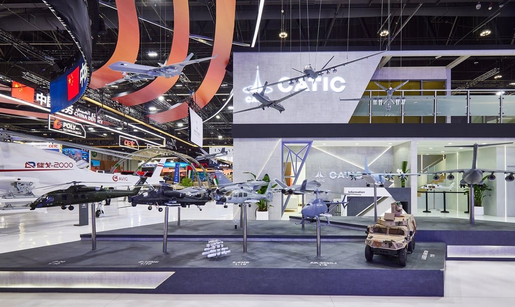 Aviation products, including fighter jets, drones and transport aircraft, are displayed at the 2025 International Defence Exhibition in Abu Dhabi. Photo: Aviation Industry Corporation of China