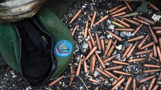 A military beret bearing the Armed Forces of the Democratic Republic of Congo (FARDC) insignia lies discarded alongside a pile of unspent cartridges near an abandoned, bullet-riddled military truck in Goma on January 31, 2025. The Rwandan-backed armed group M23 moved south as it closed in on a key military airport in DR Congo on January 31, 2025, a day after pledging to take the capital Kinshasa and as international criticism mounted. The group's capture of most of Goma, the capital of North Kivu province, earlier in the week was a dramatic escalation in a region that has seen decades of conflict involving multiple armed groups. (Photo by Tony KARUMBA / AFP)(AFP)