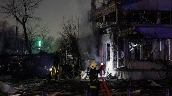 Firefighters work at a site of a Russian missile strike, amid Russia's attack on Ukraine, in Kyiv Ukraine (REUTERS/Gleb Garanich)