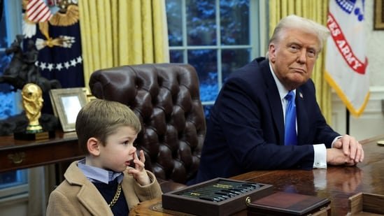 U.S. President Donald Trump looks on as X Æ A-12, Elon Musk's son, stands beside him in the Oval Office of the White House in Washington, D.C., U.S., February 11, 2025. REUTERS/Kevin Lamarque(REUTERS)