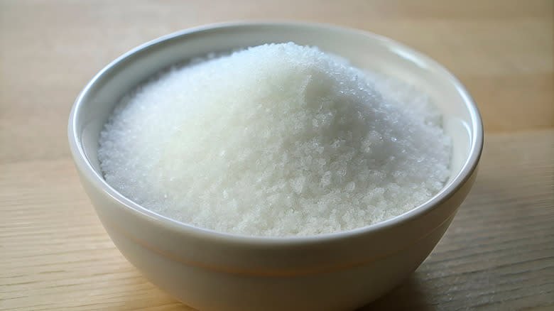 Bowl of white table sugar