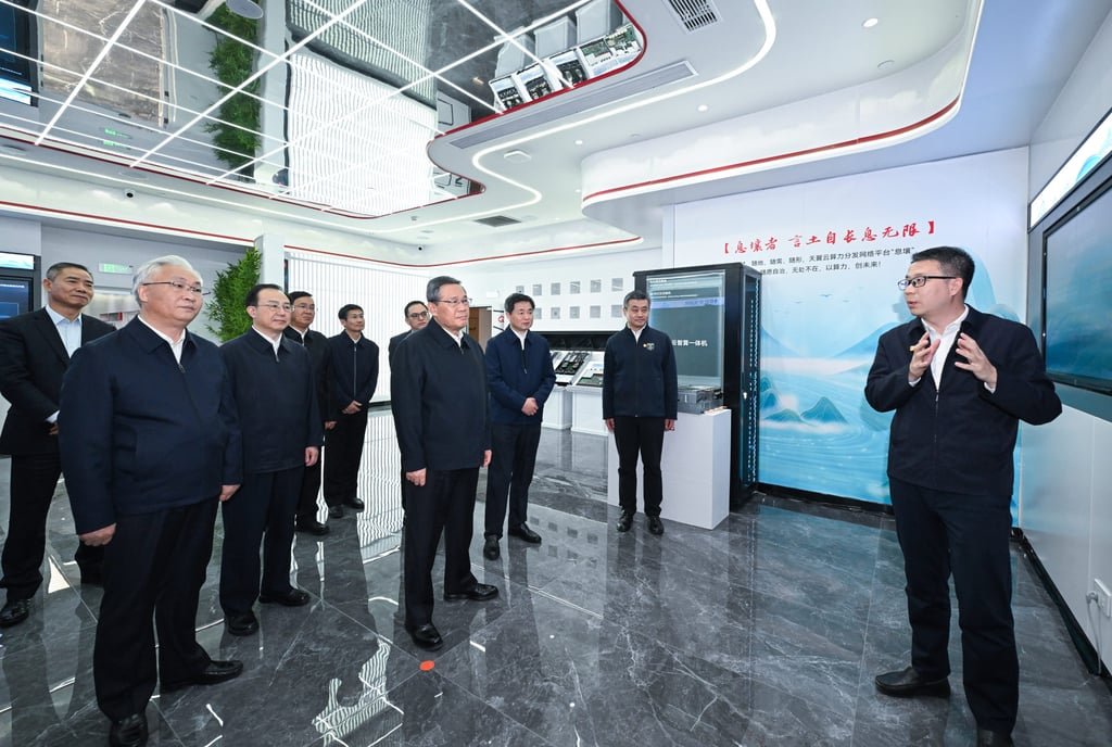 Premier Li Qiang visits a company owned by China Telecom on Tuesday. Photo: Xinhua