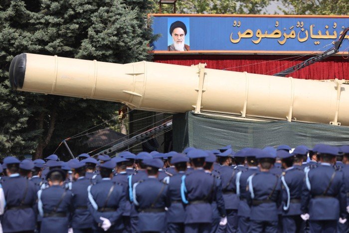 An Iranian missile and a group of soldiers during a military parade in Tehran last year