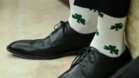 US President Trump was distracted by JD Vance's socks during a meeting with the Irish PM(AFP)