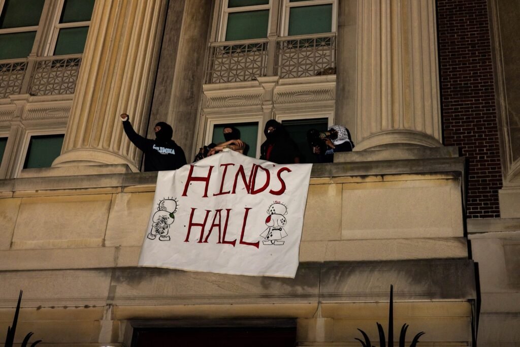 PHOTO: In this April 29, 2024, file photo, demonstrators from the pro-Palestine encampment on Columbia's Campus show a banner as they barricade themselves inside Hamilton Hall, in New York.