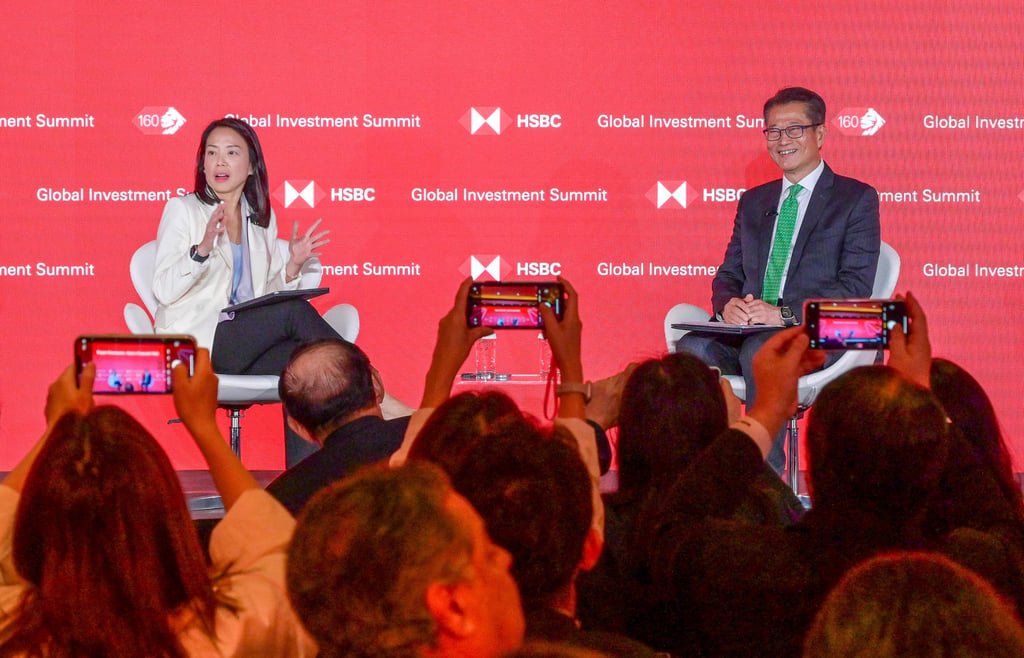 Financial Secretary Paul Chan (right) at the HSBC Global Investment Summit on Tuesday. Photo: ISD