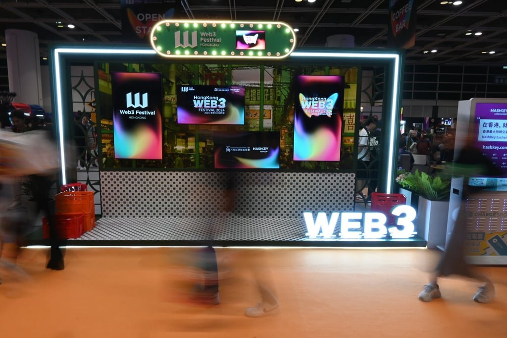 People pass by a display for the Hong Kong Web3 Festival on April 6, 2024. The city has been pushing to become a virtual asset hub. Photo: Matt Haldane