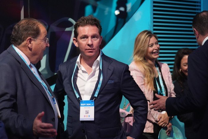 Nick and Holly Candy (centre right and left) at the Reform UK party’s annual conference at the National Exhibition Centre in Birmingham in September 2024