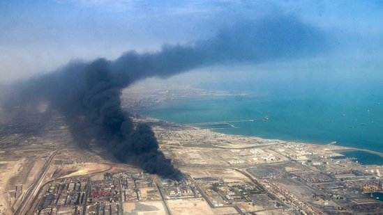 Smoke billows at the site of an explosion that took place a day earlier at the Shahid Rajaee port dock southwest of Bandar Abbas in the Iranian province of Hormozgan on April 27, 2025.(AFP)