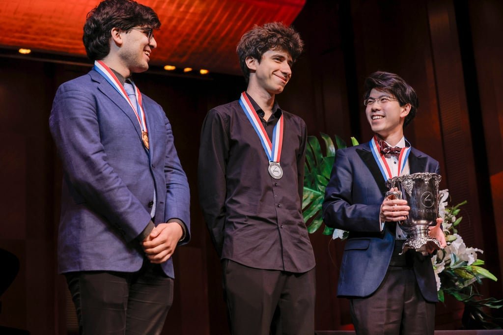 Aristo Sham, of Hong Kong (right), the overall winner, bronze medal winner Evren Ozel, of the United States (left), and Vitaly Starikov, of Israel and Russia, who came second, during the awards ceremony of the 17th Van Cliburn International Piano Competition at Bass Hall in Fort Worth, Texas, US. Photo: Brandon Wade