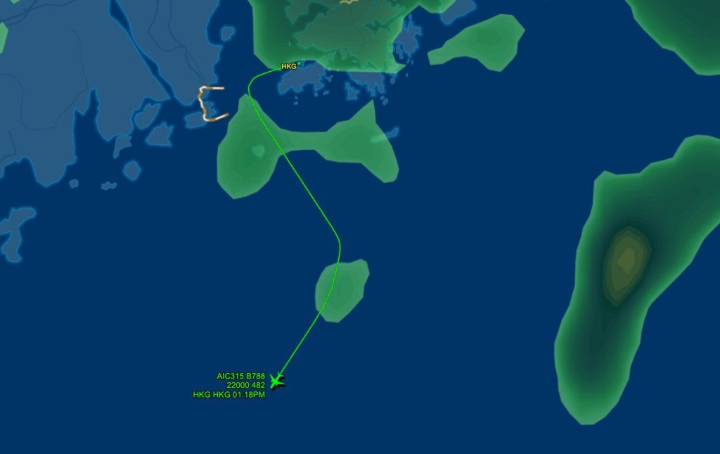 Flight path map showing Air India flight AI315 returning to Hong Kong.