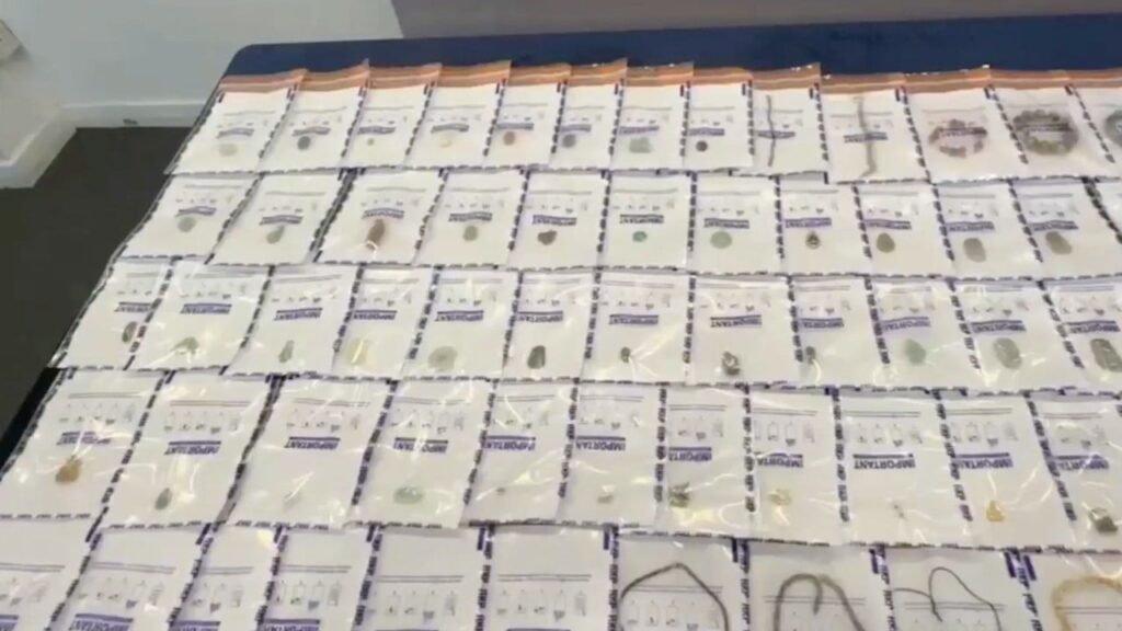 Hong Kong police arrest 2, hunting for third over burglaries at antiques warehouse