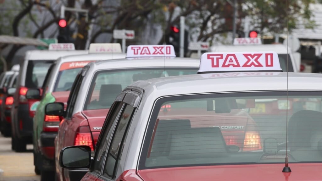 Hong Kong needs route for taxis, ride-hailing firms to co-exist: lawmakers