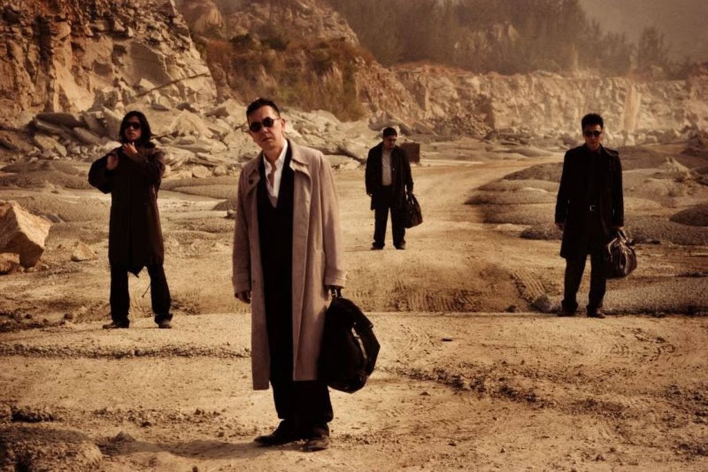 Anthony Wong (front) in a still from Exiled (2006). Photo: Magnolia Pictures