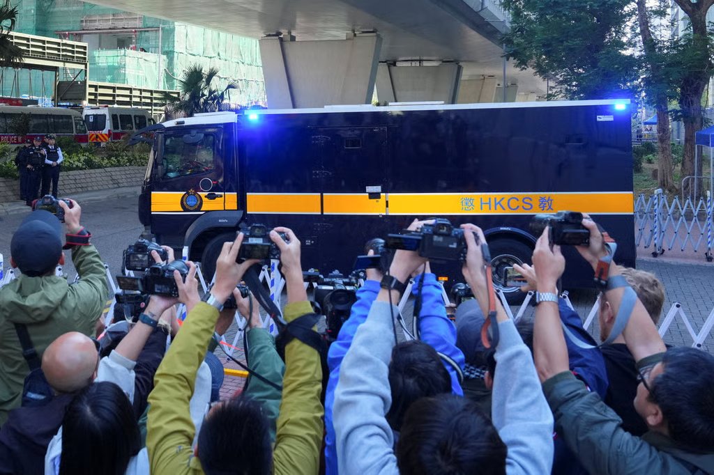 A prison van believed to be carrying Jimmy Lai leaves the West Kowloon Magistrates’ Courts building on December 15. Photo: Reuters
