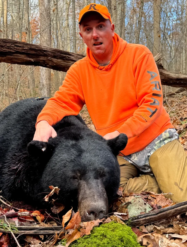 A hunter with a big Pennsylvania black bear.