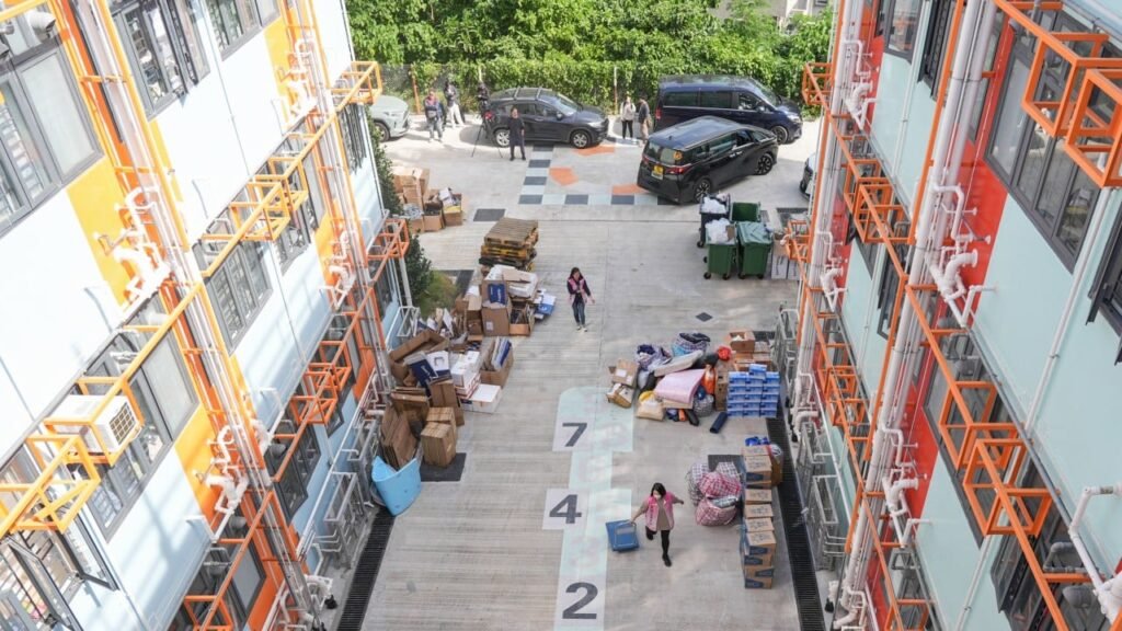 2,100 residents left homeless by Hong Kong fire stay in temporary housing, hotels