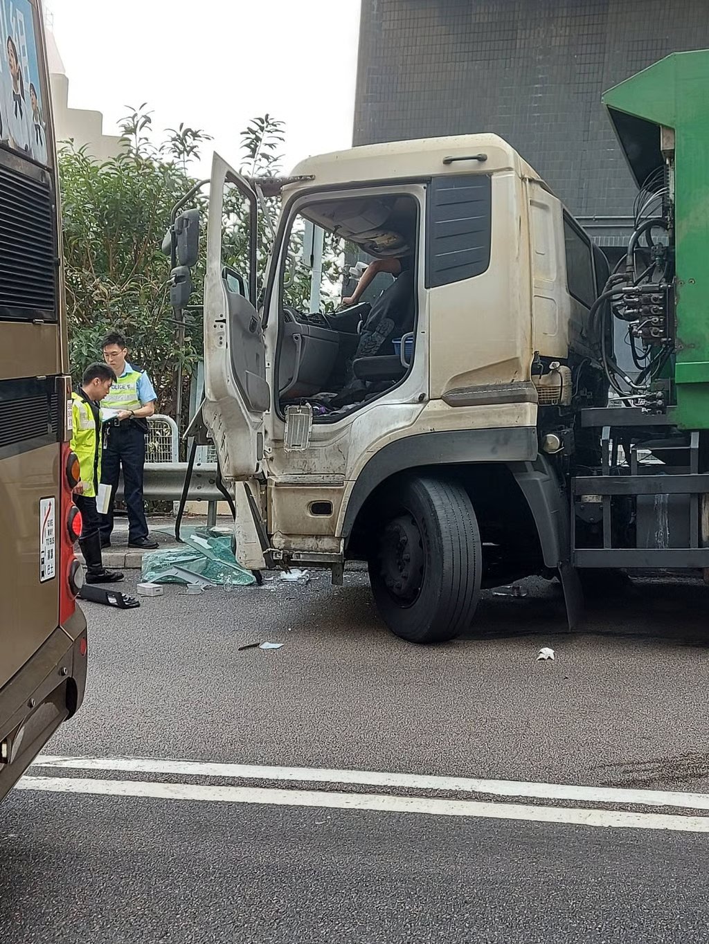 The driver of the rubbish truck has been taken to Yan Chai Hospital in Tsuen Wan for treatment. Photo: Handout