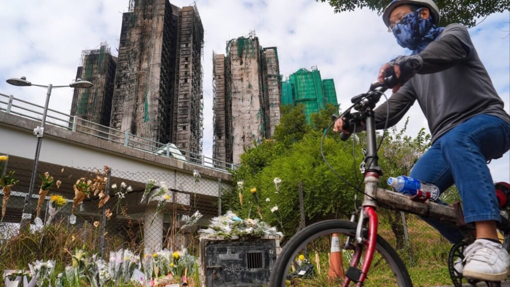 Residents of tower spared in Hong Kong blaze get 90 minutes to fetch belongings