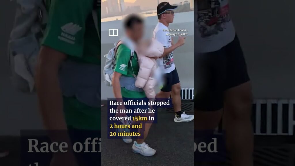 Police probe child abuse report after man runs with baby in Hong Kong Marathon
