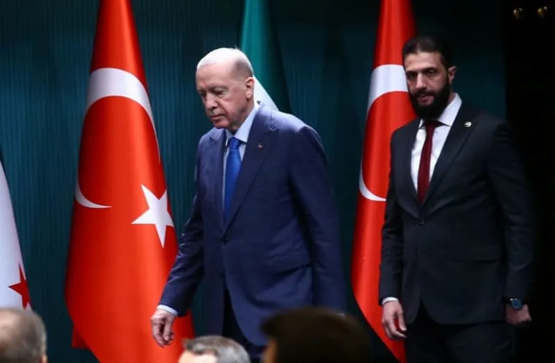 Syrian President Ahmed al-Sharaa and Turkish President Recep Tayyip Erdogan arrive for a joint press conference at the Presidential Palace in Ankara, Turkey, February 4, 2025. (credit: REUTERS/CAGLA GURDOGAN)