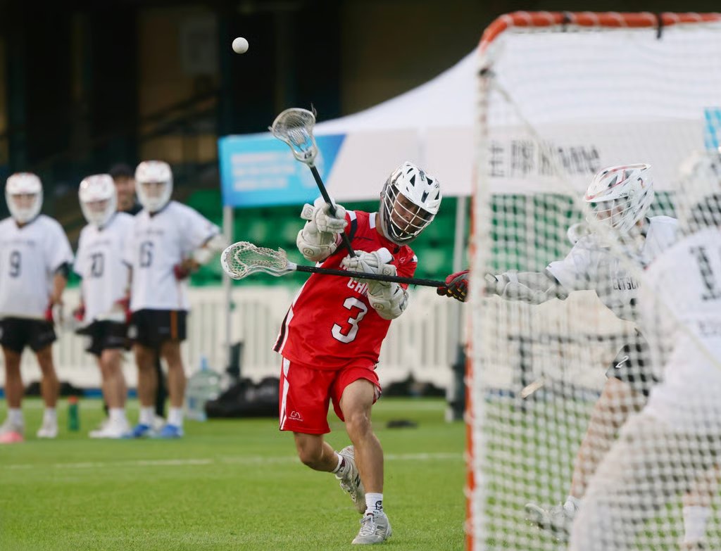 Hong Kong (red) played Germany in the semi-final at the International Lacrosse Sixes. Photo: Jonathan Wong