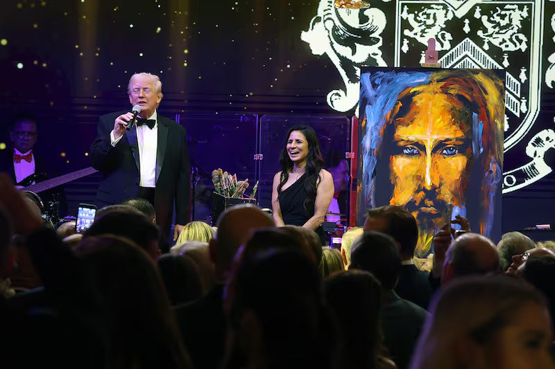 U.S. President Donald Trump speaks to guests during a New Year’s Eve event at his Mar-a-Lago home on December 31, 2025 in Palm Beach, Florida.