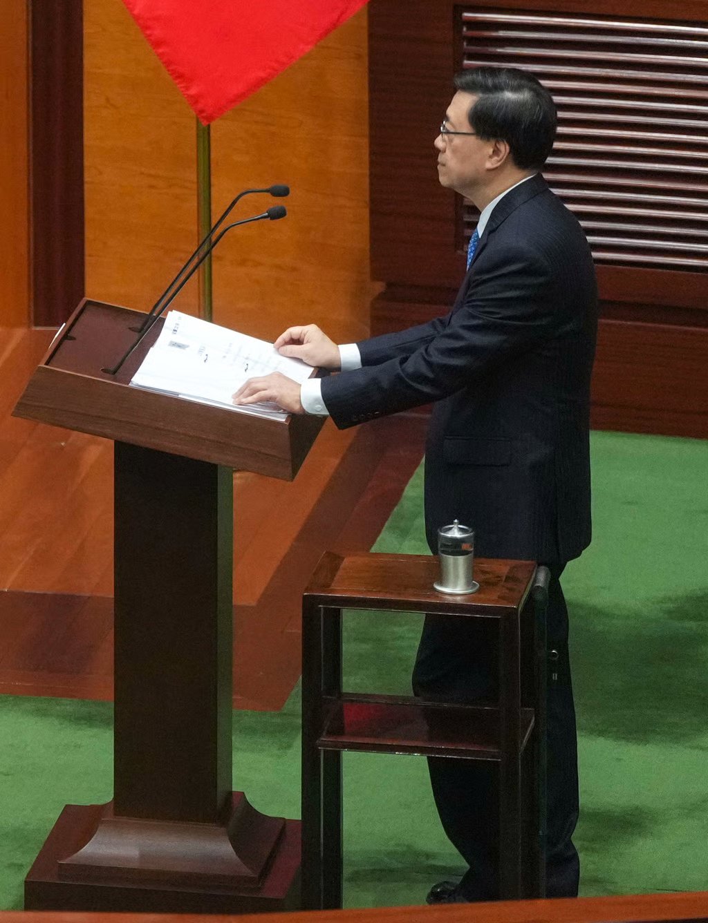 Chief Executive John Lee has a side table beside him for support. Photo: Sam Tsang