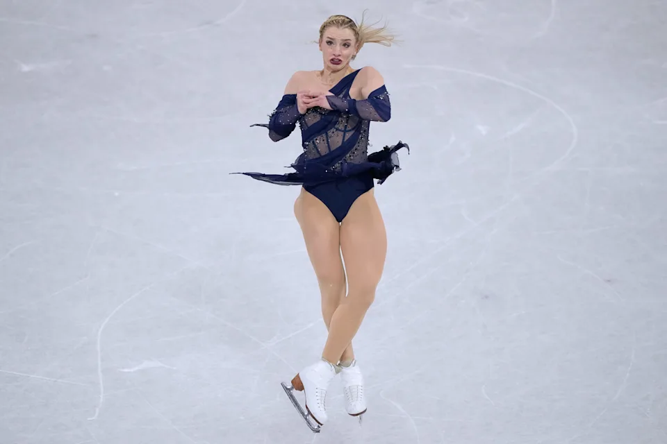Amber Glenn of the United States competes during the figure skating women's team event at the 2026 Winter Olympics, in Milan, Italy, Sunday, Feb. 8, 2026. (AP Photo/Natacha Pisarenko)