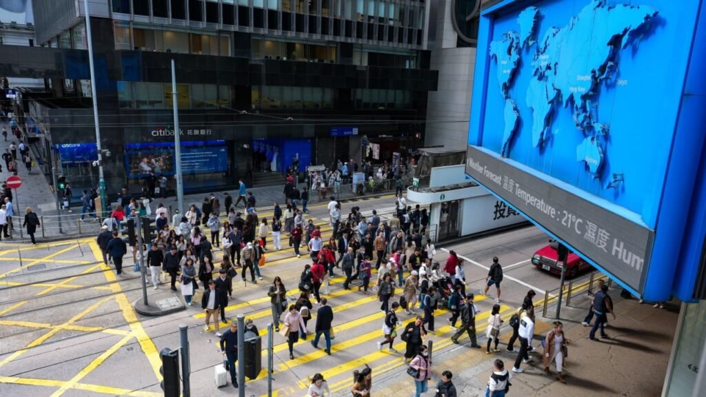 Hong Kong business confidence hits 2-year high, survey finds