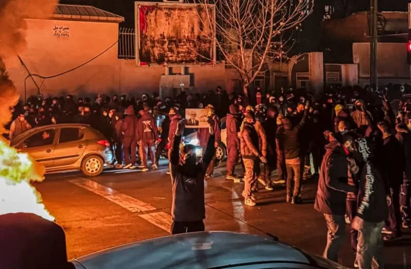 Iranians gather while blocking a street during a protest in Tehran, Iran on January 9, 2026. The nationwide protests started in Tehran's Grand Bazaar against the failing economic policies in late December, which spread to universities and other cities (credit: MAHSA/Middle East Images/AFP via Getty Images)