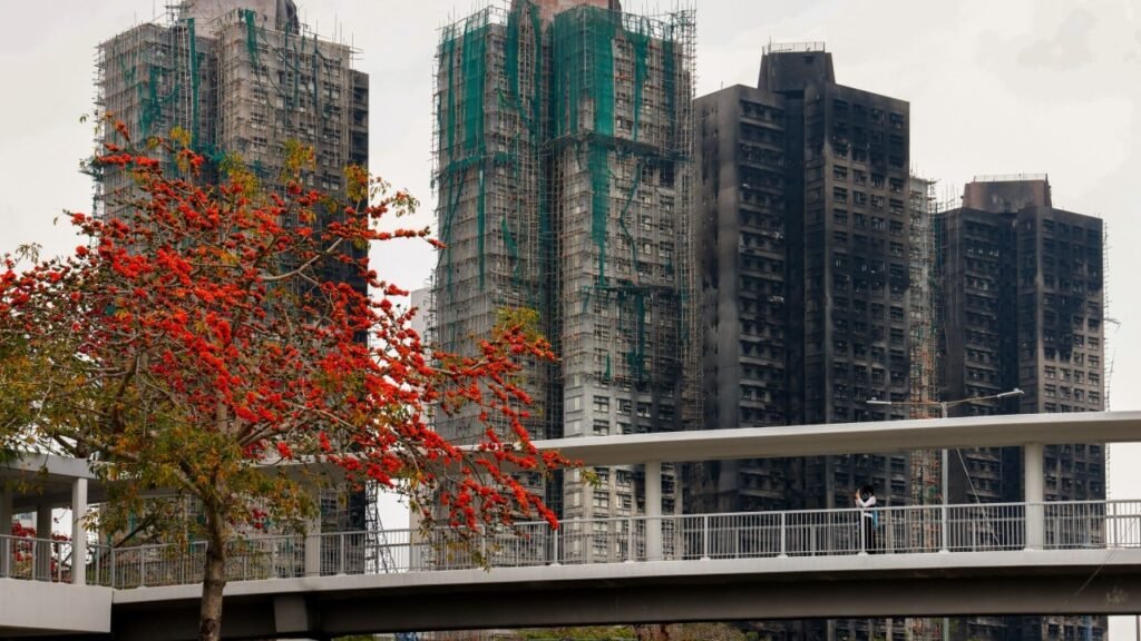 Hong Kong official warns of lower payout if Tai Po fire victims reject buy-back plan