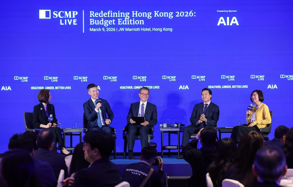 (Left to Right) SCMP deputy Hong Kong editor Olga Wong, AIA CEO Alger Fung, finance chief Paul Chan, Hong Kong McKinsey managing partner Arthur Shek and SCMP news editor Denise Tsang. Photo: Dickson Lee
