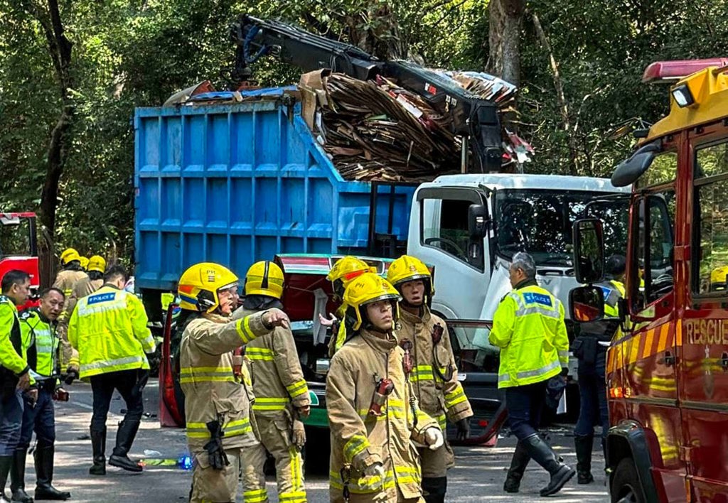 Police and firefighters at the scene of the accident. Photo: Handout