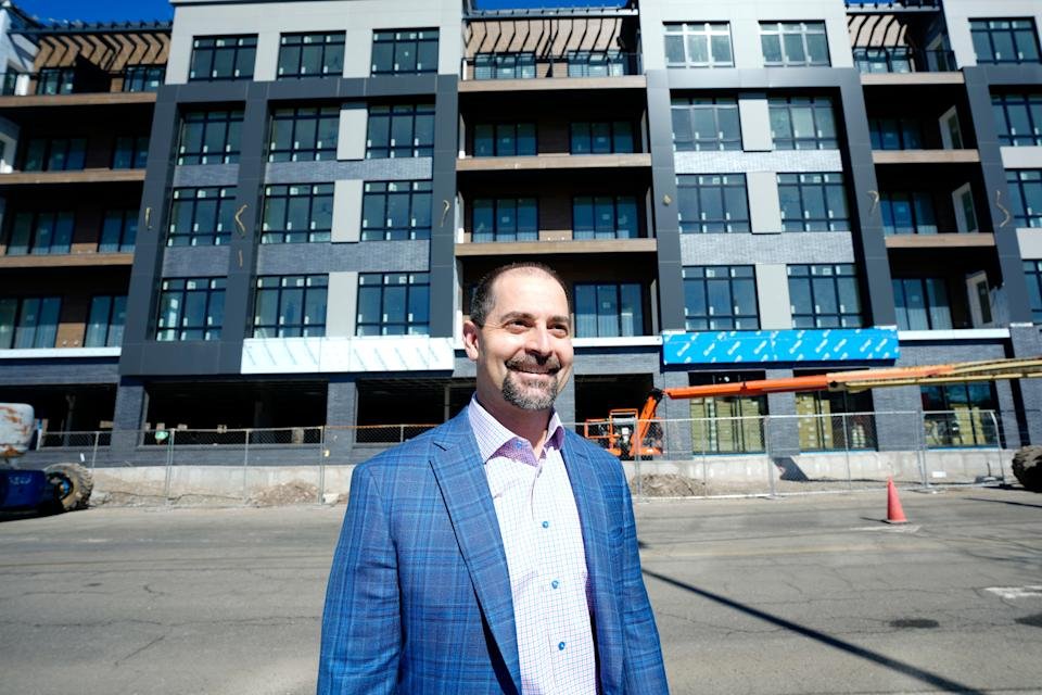 Edward Russo, CEO of Russo Development, posses for a photograph in front of Vermella Paramus apartments, Monday, March 9, 2026.