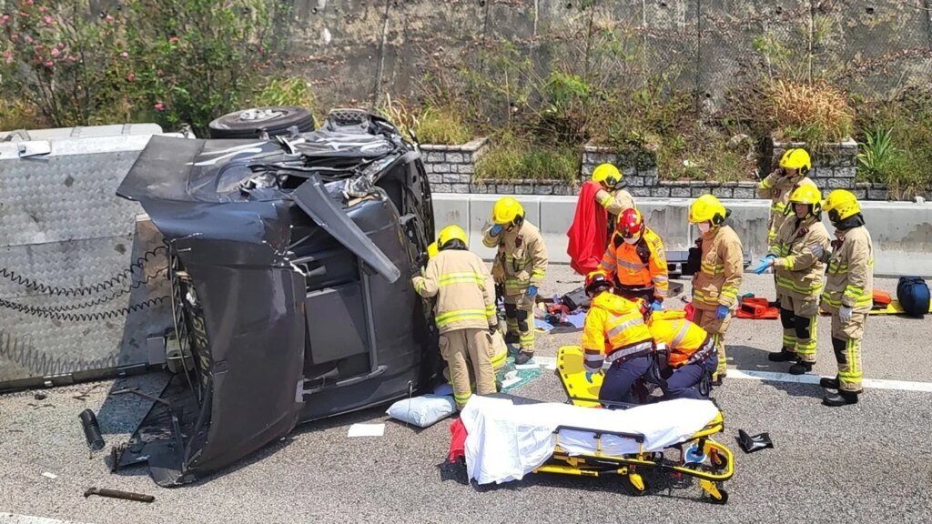 Truck driver injured as vehicle slams into fire engine on Hong Kong highway
