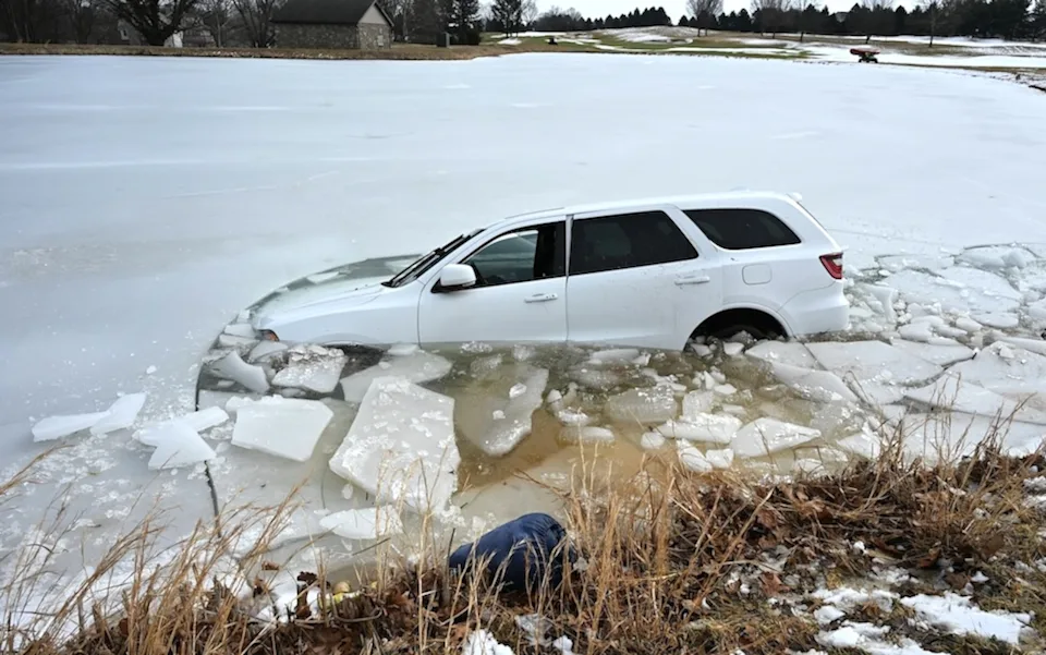 N.J. man cited after SUV crashes through frozen golf pond