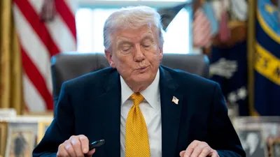 US President Donald Trump during an executive order signing in the Oval Office of the White House in Washington, DC, US. (Bloomberg)