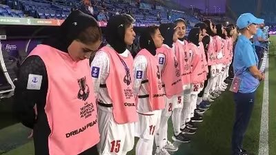 The Iranian women's national football team faces potential danger upon returning home after criticism for their anthem protests.
