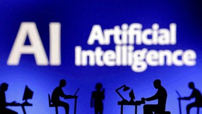 FILE PHOTO: Figurines with computers and smartphones are seen in front of the words "Artificial Intelligence AI" in this illustration created on February 19, 2024. REUTERS/Dado Ruvic/Illustration//File Photo (REUTERS)