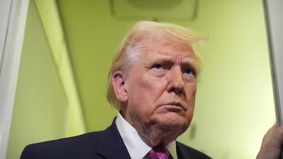 President Donald Trump speaks to reporters aboard Air Force One en route from West Palm Beach, Fla., to Joint Base Andrews, Md., Sunday, March 29, 2026. (AP)