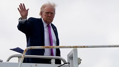 US President Donald Trump waves as he boards Air Force One at Palm Beach International Airport in West Palm Beach, Florida, U.S., March 29, 2026. (REUTERS)