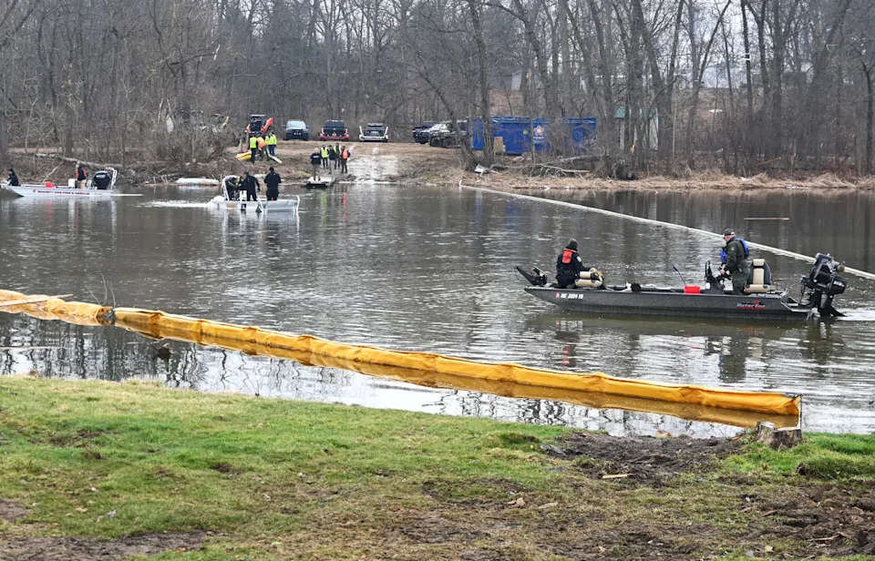 Crews prepare to clean debris from the cove at the Union Lake public access left by the March 6 EF-3 tornado on Saturday March 21, 2026