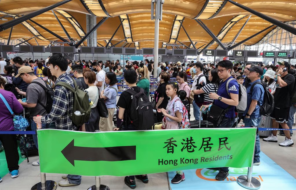 Travellers wait to cross the border at the Hong Kong-Zhuhai-Macau Bridge Control Point in 2024. The Immigration Department said it had minimised leave for frontline officers to allow for flexible deployment and would operate additional counters and channels. Photo: Edmond So